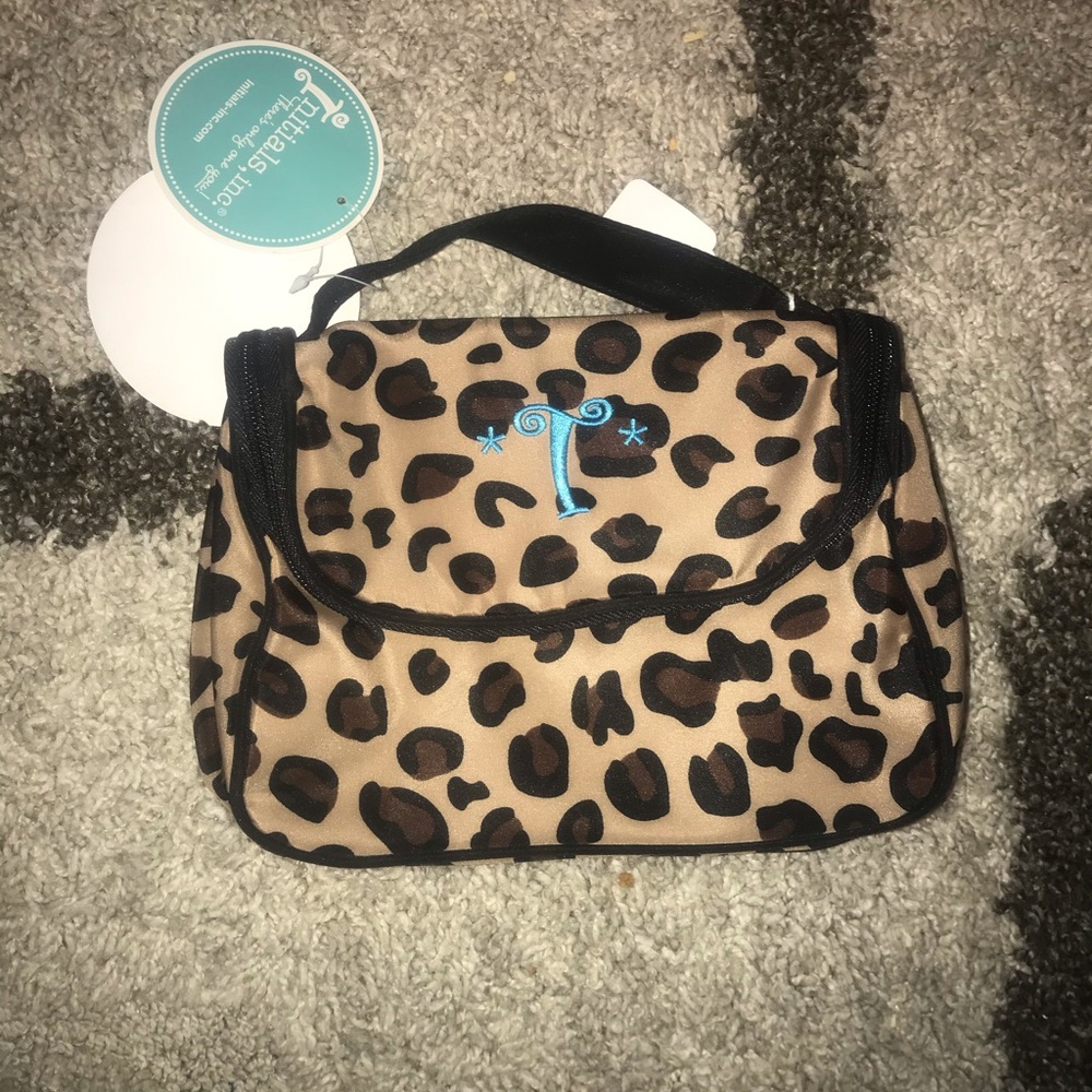 Initials Inc- you zip cosmetic